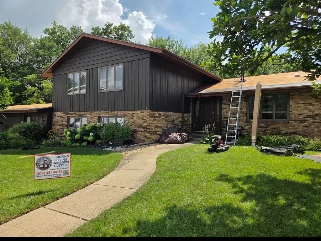 brown house with ladder